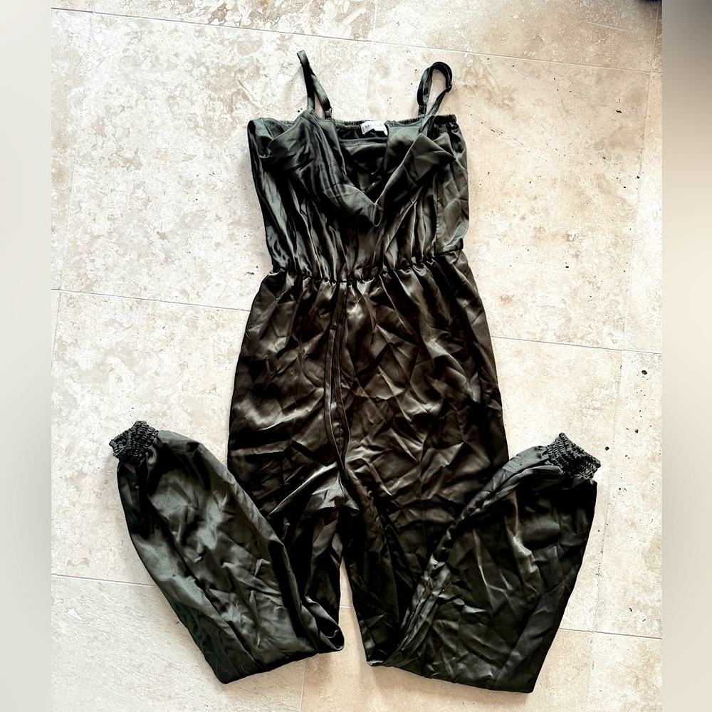 size S, dark olive green satin jumpsuit. original sizing/brand tag is still on.